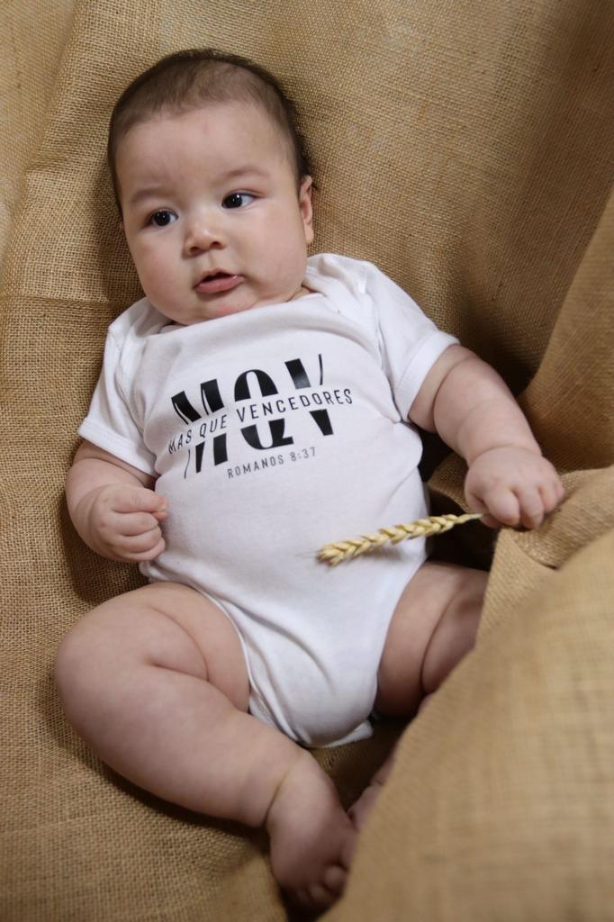 baby in white mqv classic onsie
